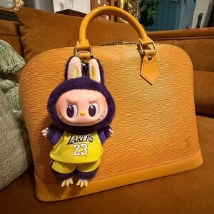 Authentic Louis Vuitton Epi Alma PM
Yellow Handbag w/ Laker Labubu